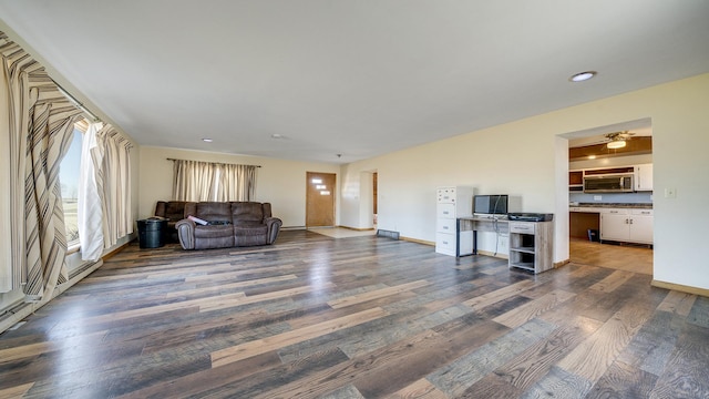 unfurnished living room with hardwood / wood-style flooring