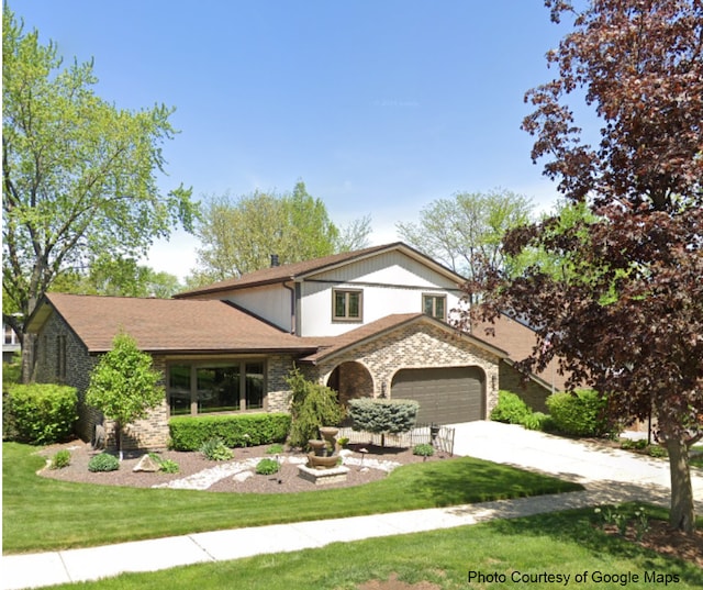 view of front of home with a front yard