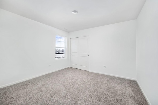 spare room featuring carpet