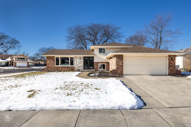 split level home featuring a garage