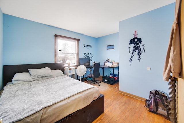 bedroom featuring light hardwood / wood-style floors