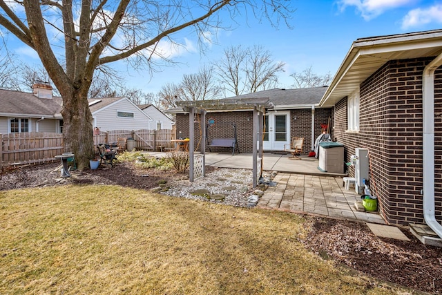 view of yard with a pergola and a patio area