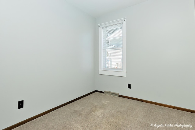 view of carpeted spare room