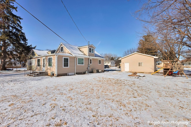 view of snow covered house