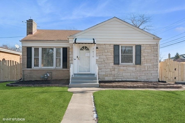 view of front of house with a front lawn