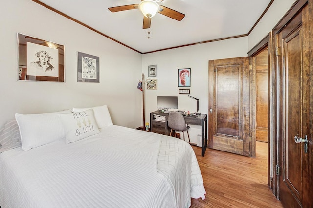 bedroom with crown molding, ceiling fan, and light wood-type flooring