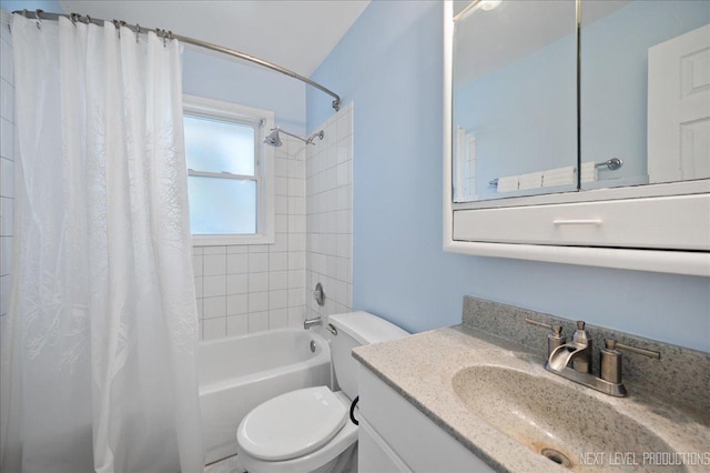 full bathroom featuring toilet, vanity, and shower / bath combination with curtain