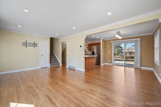 unfurnished living room featuring light wood-type flooring, stairway, baseboards, and recessed lighting