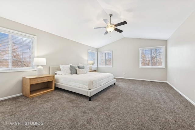 carpeted bedroom featuring lofted ceiling and ceiling fan