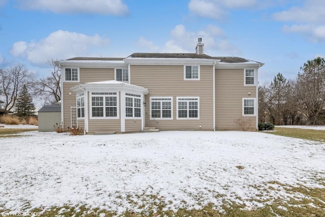 view of snow covered property