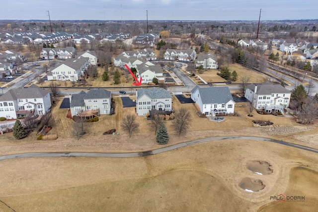 birds eye view of property with a residential view