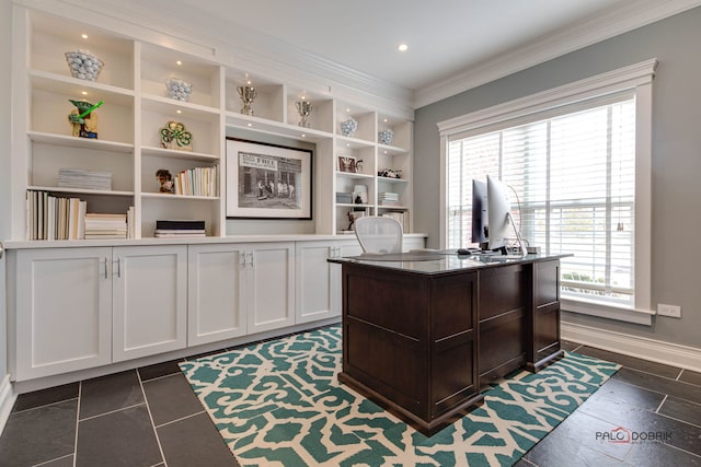 home office featuring ornamental molding, a healthy amount of sunlight, baseboards, and built in shelves