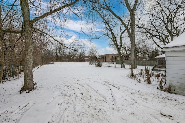 view of yard covered in snow