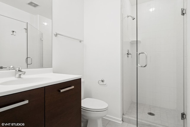 full bath featuring tile patterned flooring, toilet, vanity, visible vents, and a shower stall