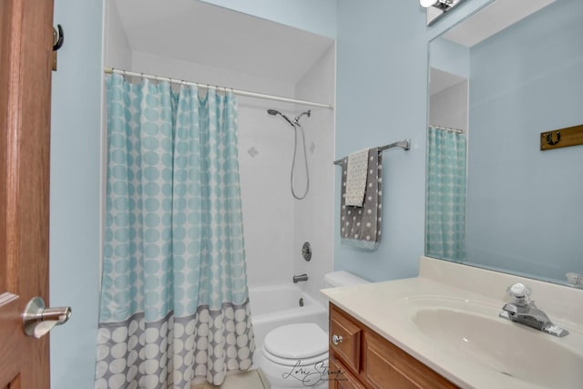 full bathroom with vanity, toilet, and shower / bath combo with shower curtain