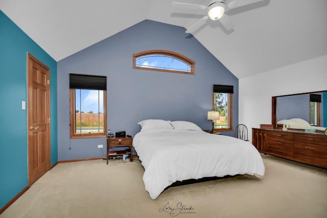 carpeted bedroom featuring ceiling fan and lofted ceiling