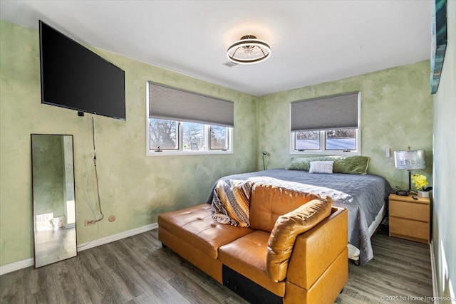 bedroom featuring hardwood / wood-style flooring