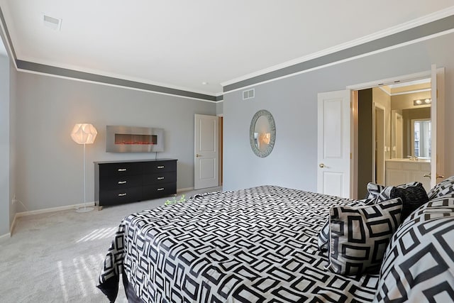 carpeted bedroom featuring crown molding