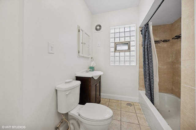 full bathroom featuring shower / tub combo, baseboards, toilet, tile patterned flooring, and vanity