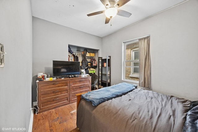 bedroom featuring ceiling fan and light wood finished floors