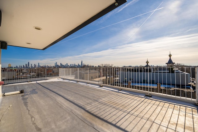 view of patio / terrace featuring a balcony