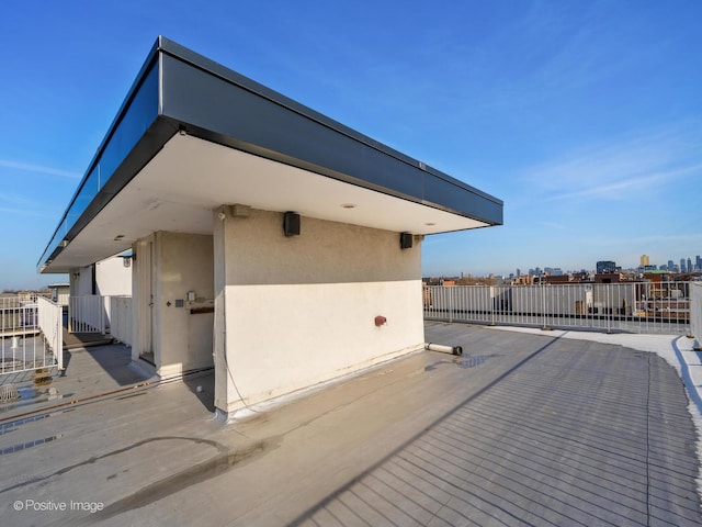 view of side of home featuring a patio area