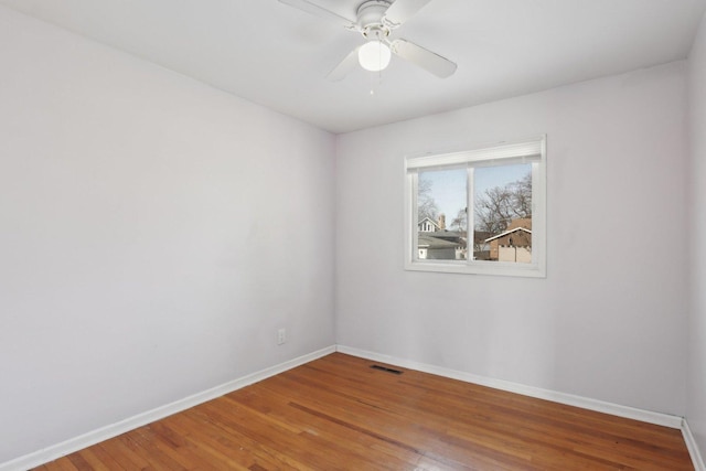 unfurnished room featuring wood-type flooring and ceiling fan