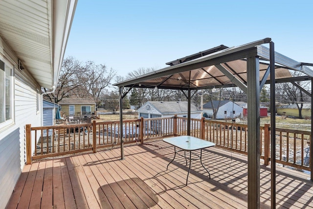 wooden terrace with a gazebo