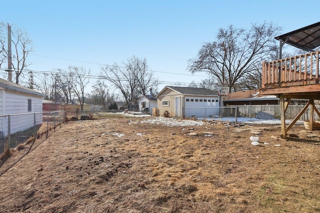 view of yard with an outbuilding and a garage