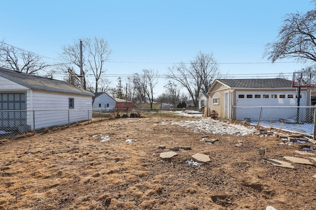 view of yard featuring a garage