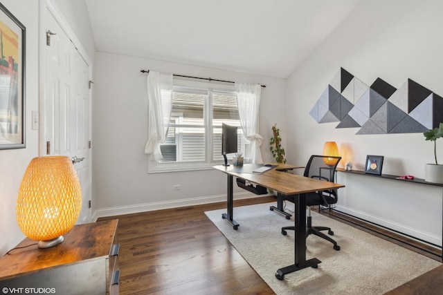 office featuring vaulted ceiling and dark hardwood / wood-style floors