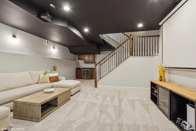 carpeted living room featuring indoor bar and beverage cooler