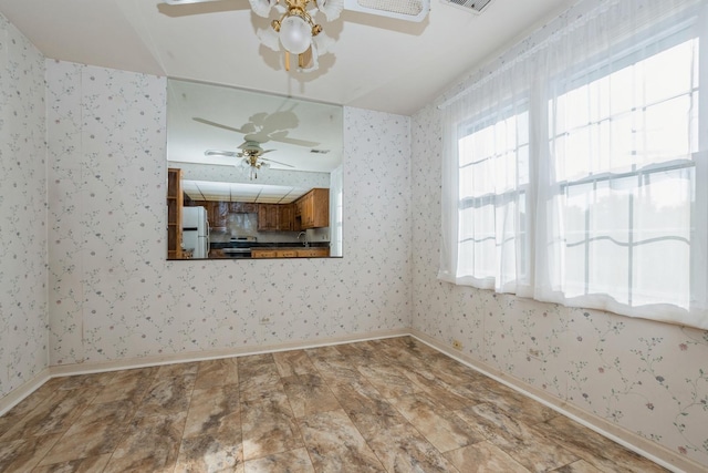 empty room with ceiling fan