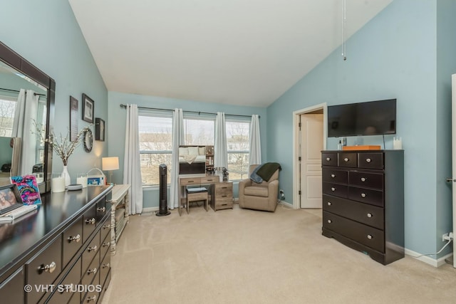 sitting room with light carpet and vaulted ceiling