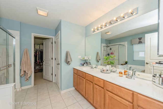 bathroom featuring tile patterned floors, vanity, and independent shower and bath