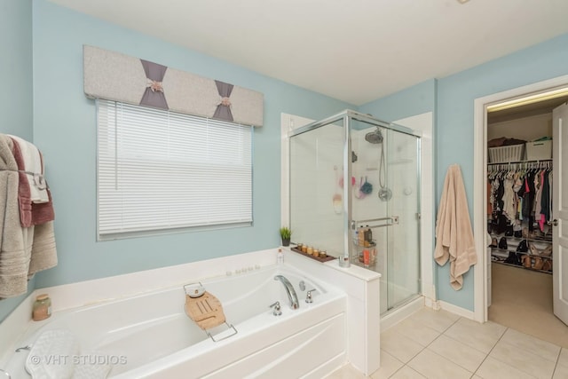 bathroom with plus walk in shower and tile patterned flooring