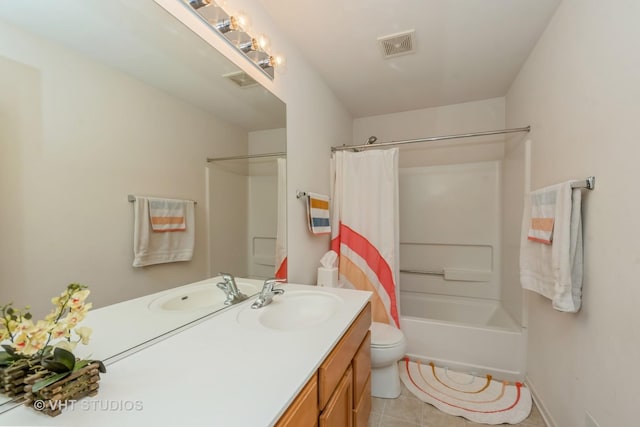 full bathroom featuring vanity, toilet, tile patterned floors, and shower / bathtub combination with curtain