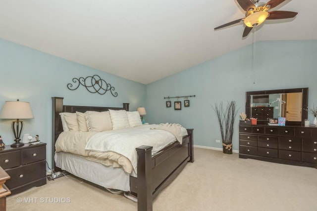 bedroom featuring ceiling fan, light carpet, and lofted ceiling