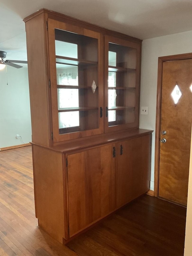 spare room featuring wooden walls