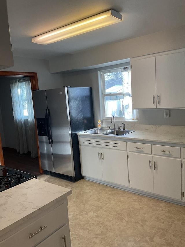 miscellaneous room with wooden walls and concrete flooring