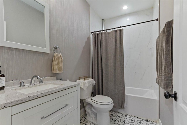 full bathroom with shower / bath combo with shower curtain, toilet, and vanity