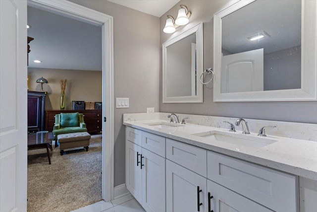 bathroom featuring vanity and tile patterned flooring