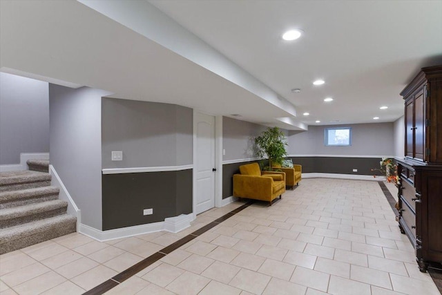 basement with light tile patterned flooring