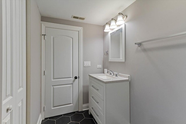 bathroom featuring vanity and tile patterned floors