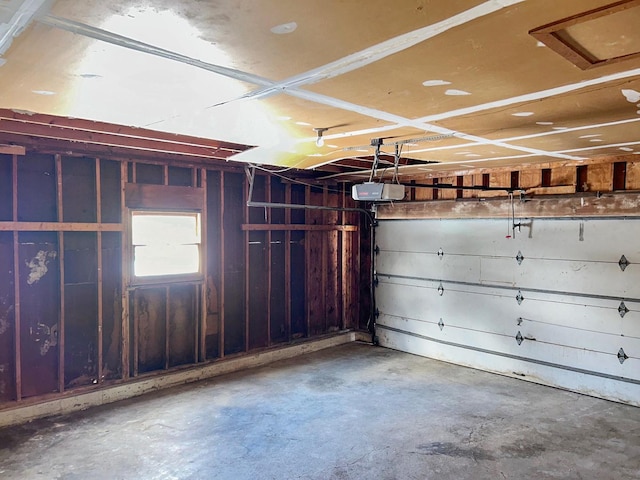 garage featuring a garage door opener