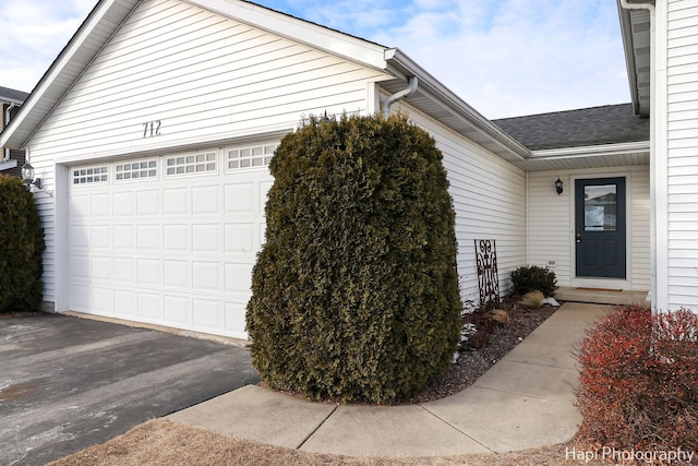 exterior space with a garage