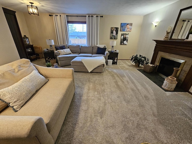 carpeted living room featuring a brick fireplace