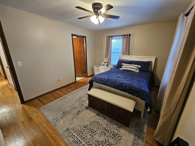 bedroom featuring ceiling fan and hardwood / wood-style floors