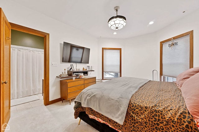 carpeted bedroom featuring a closet