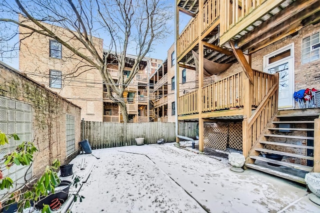 view of snow covered patio